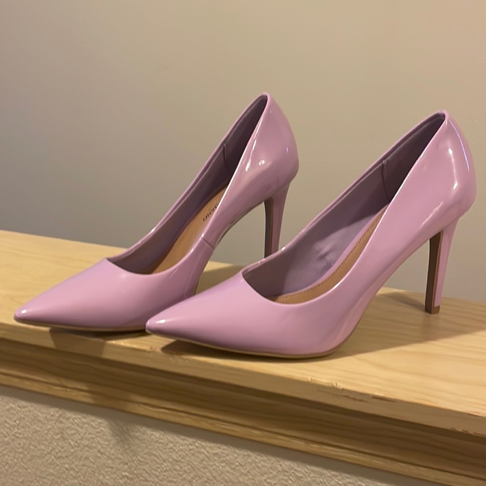 Christian Soriano never worn size 9 purple in color.